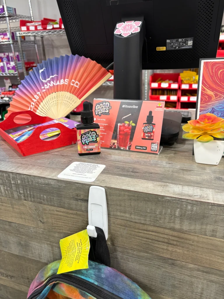 Good Vibes display materials set against warm wood surfaces at Liberty Market - Lanesborough.