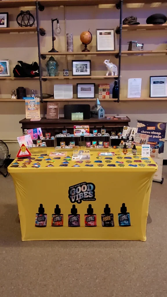 Good Vibes bottles and colorful display cards at CNA Stores - Haverhill.
