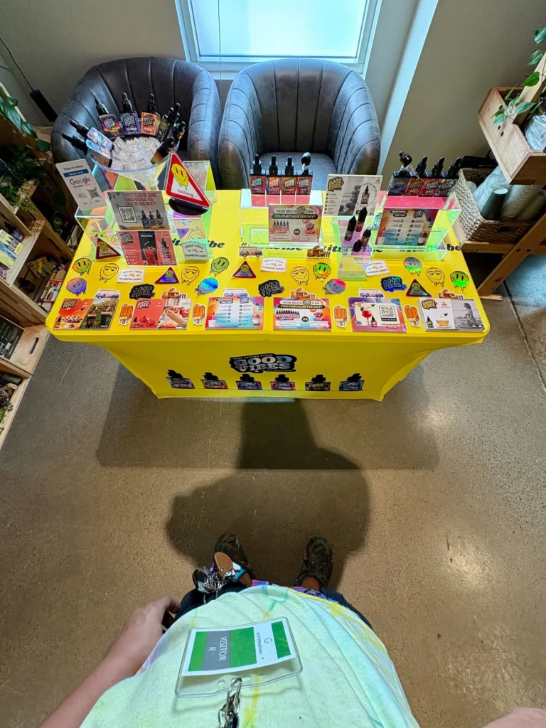 Good Vibes display with Good Vibes packaging and product information at Green Meadows – Fitchburg.