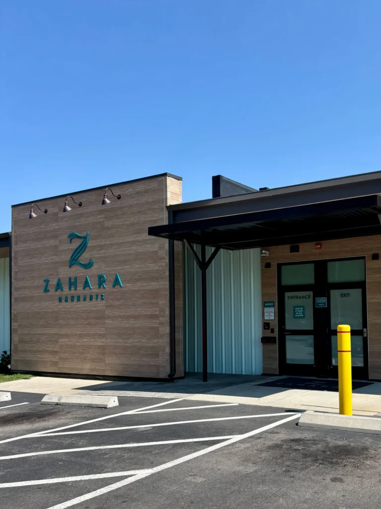 Zahara Cannabis – Attleboro interior with Good Vibes packaging and product information.