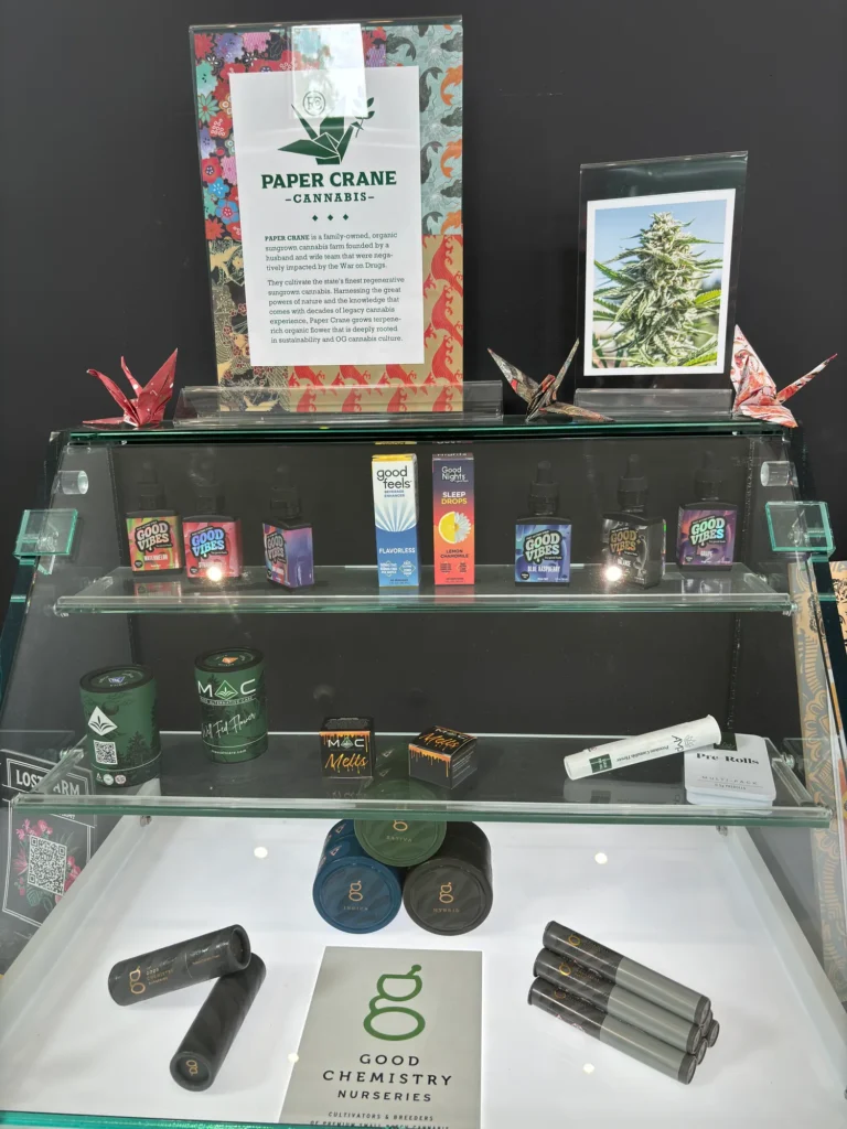 Polished retail display featuring Good Vibes products at Collective Premium Cannabis – Billerica.
