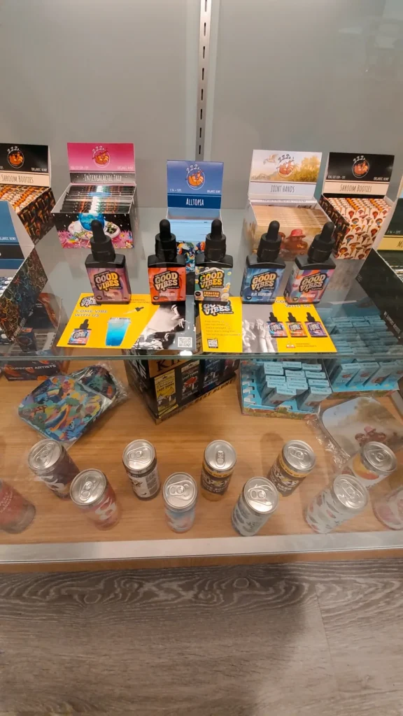A Good Vibes sign anchoring the retail display at Aura - Fall River.