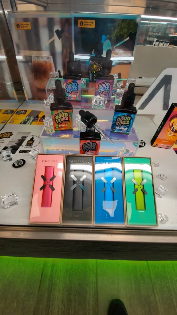 A Good Vibes sign anchoring the retail display at Greener Leaf - Fall River.