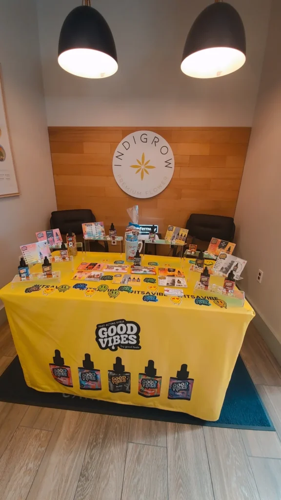 A Good Vibes display arranged across the retail counter at Renew Cannabis Co (Berkley).