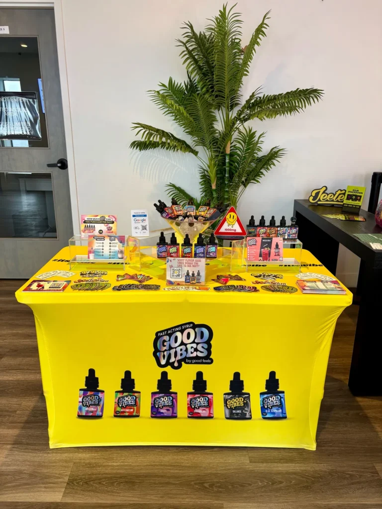 Good Vibes display with Good Vibes packaging and product information at Lowell Cannabis Co..