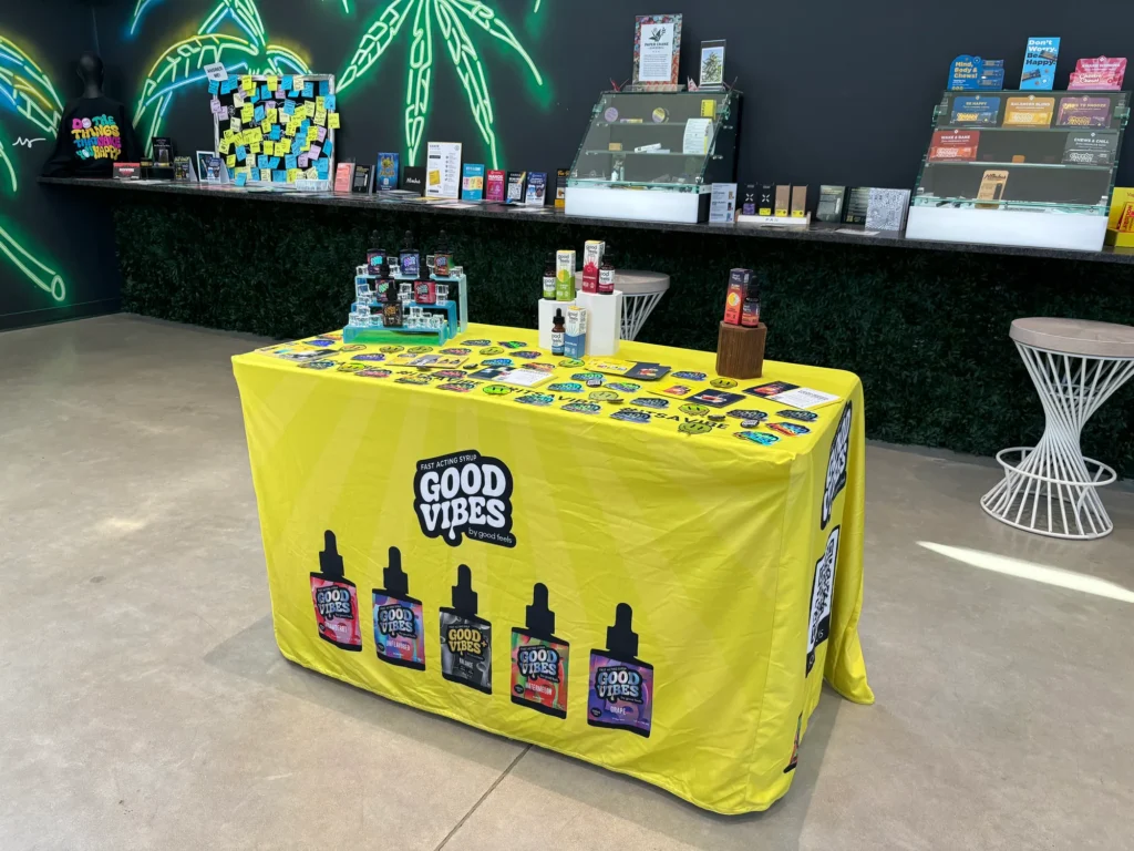 Bright branded display featuring fast-acting syrup and Watermelon at Collective Premium Cannabis – Billerica.