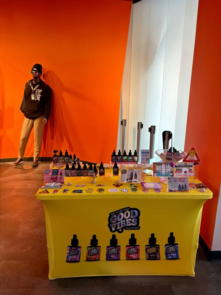 Good Vibes display with Blue Raspberry and Watermelon bottles at Solar Cannabis – Seekonk.