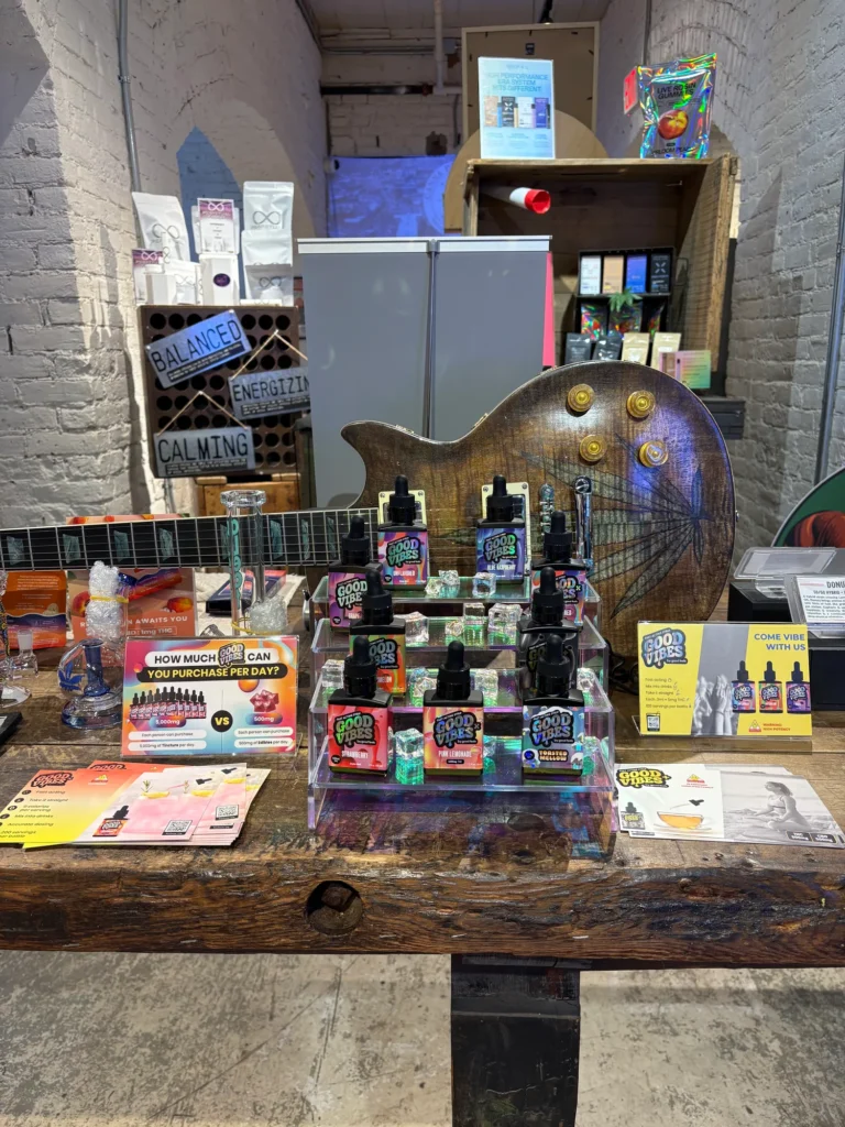 A Good Vibes sign anchoring the retail display at Canna Provisions - Holyoke.