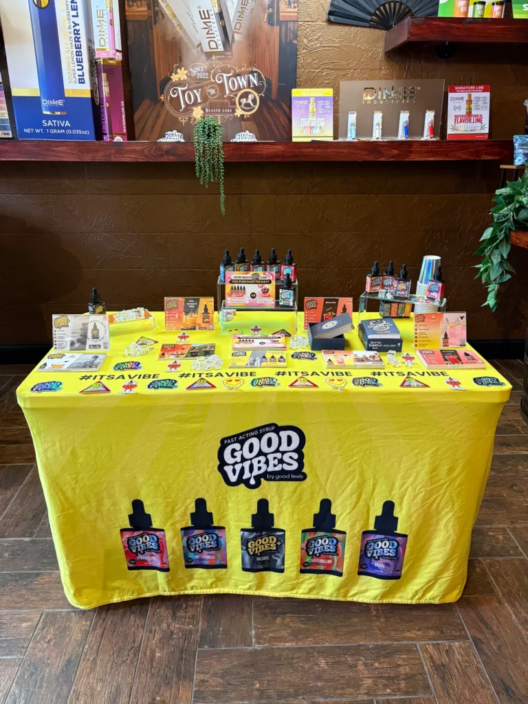 A Good Vibes sign anchoring the retail display at Toy Town Health Care - Winchendon.