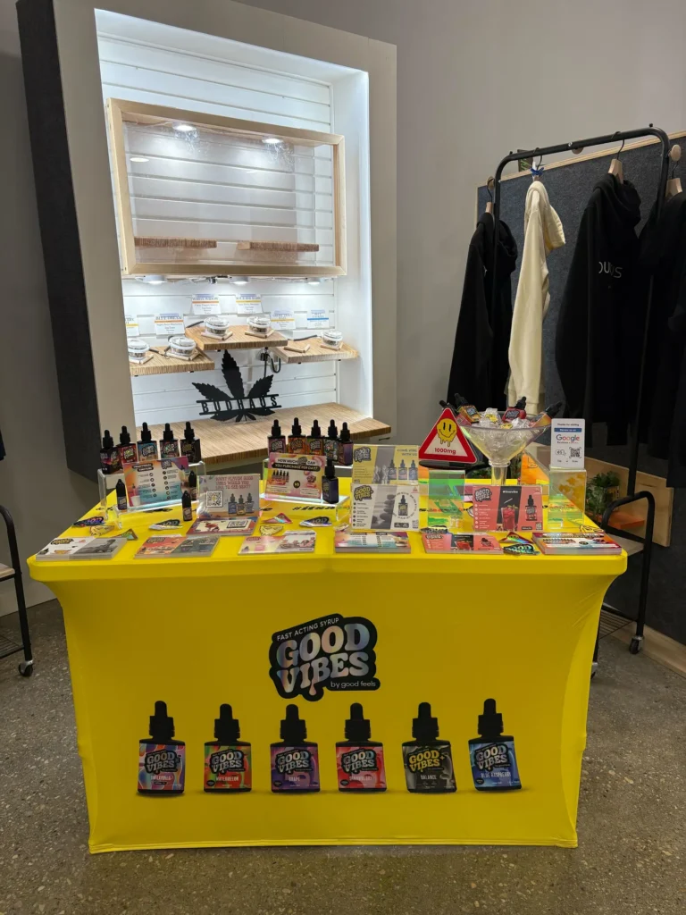 Good Vibes bottles and colorful display cards at Budhaus - Pittsfield.