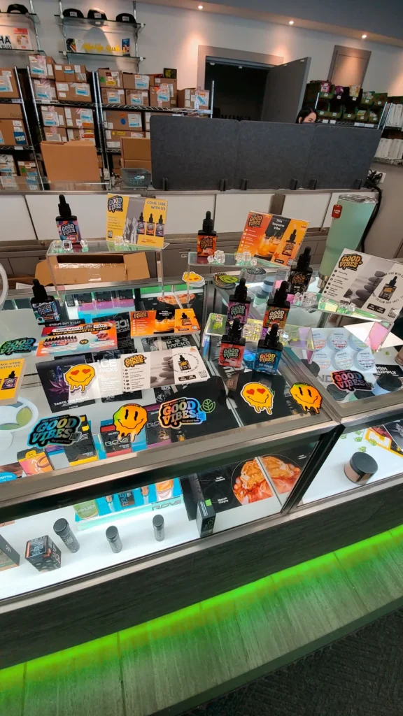 A Good Vibes display set within the shop interior at Greener Leaf - Fall River.