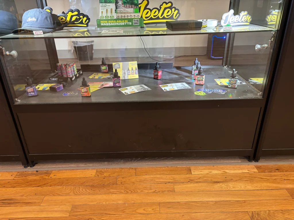 Bottles and colorful display cards at Green City - Attleboro.