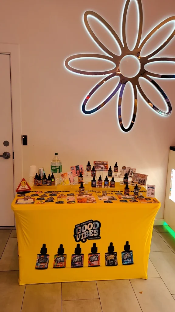 Good Vibes bottles and colorful display cards at BOUTIQ - East Boston.