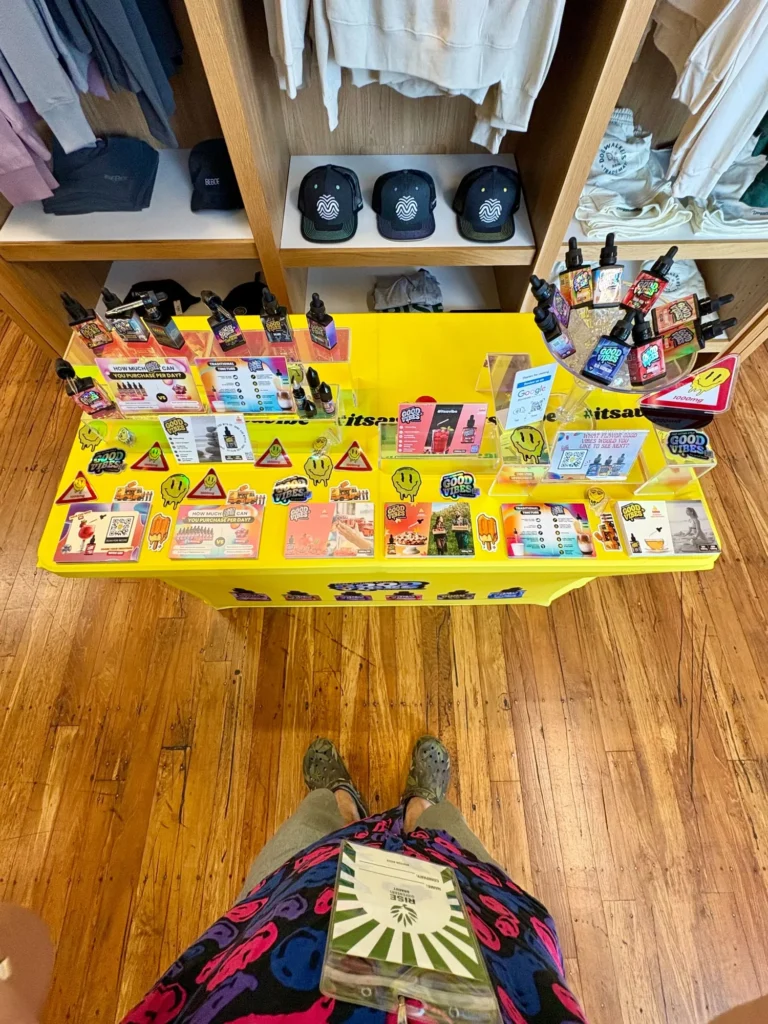 Good Vibes display with Good Vibes packaging and product information at Rise – Dracut.