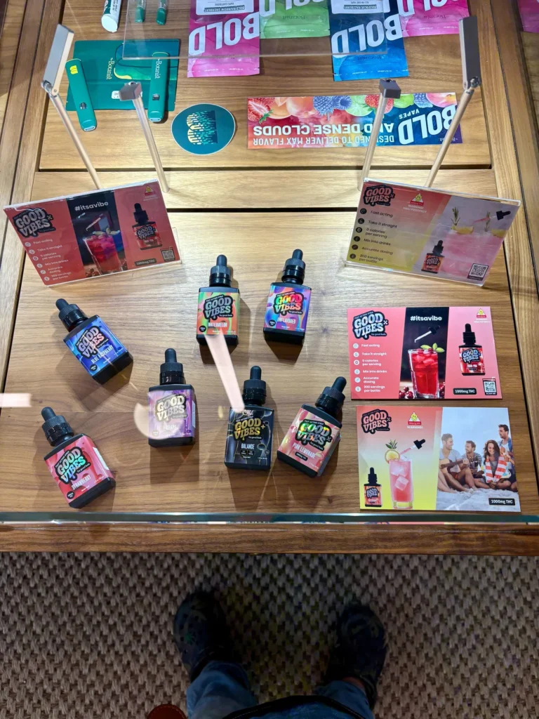 Bottles and colorful display cards at The Botanist - Worcester.