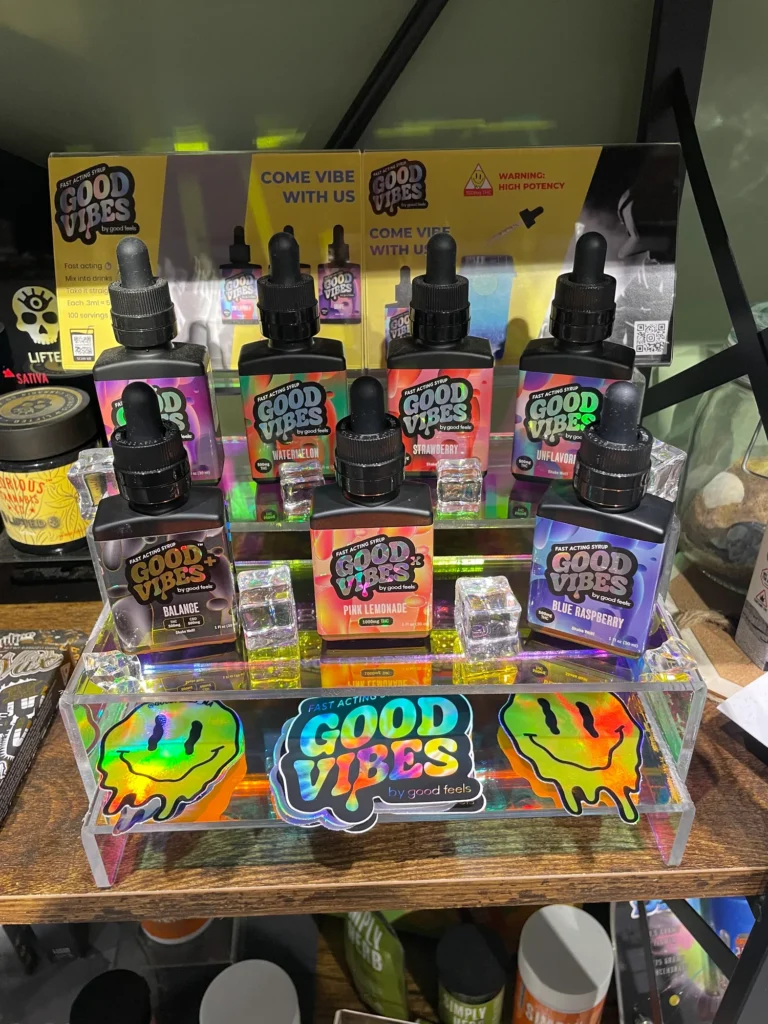 Bright retail display featuring fast-acting syrup and Pink Lemonade at Dutchess Cannabis – Framingham.