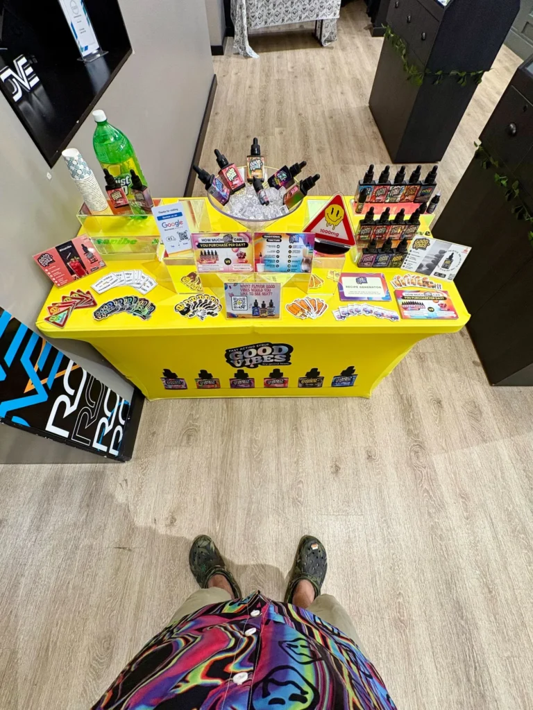 Good Vibes display with Good Vibes packaging and product information at New England Harvest – Clinton.