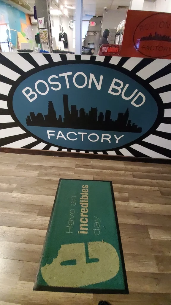 A retail sign anchoring the display at Boston Bud Factory - Holyoke.