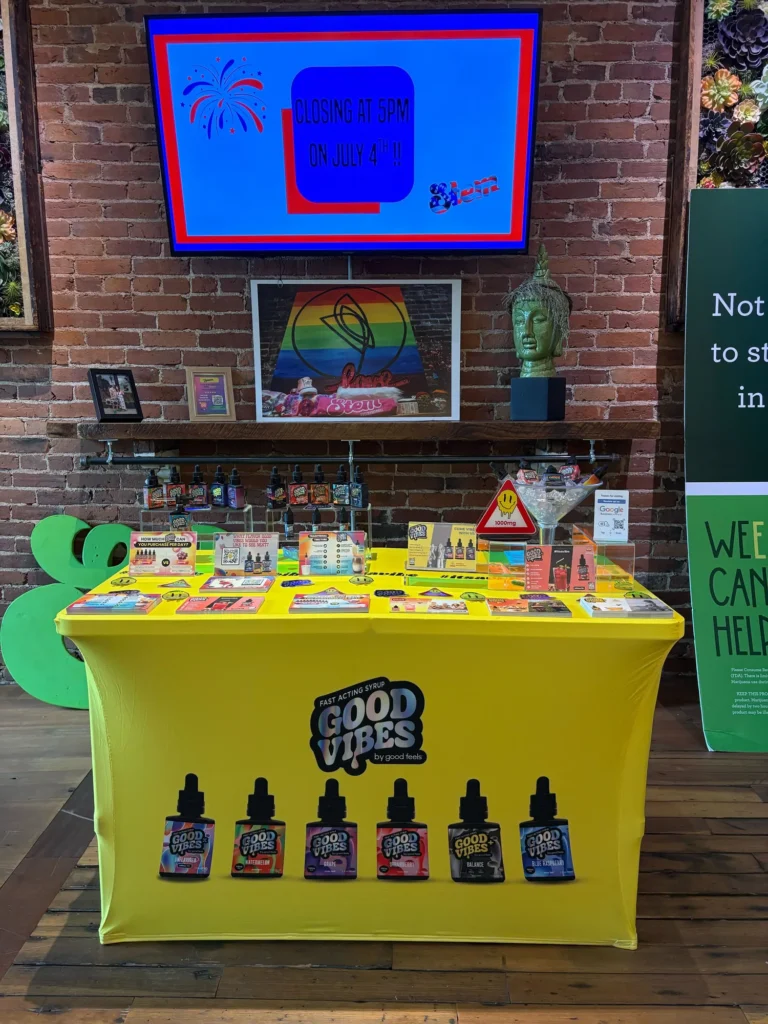Good Vibes bottles and colorful display cards at Stem - Haverhill.