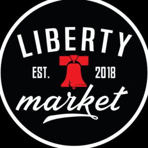 Logo: circular black emblem with white border, 'LIBERTY' arched at top, red Liberty Bell centerpiece, 'EST. 2018' on the sides, and 'market' in cursive.
