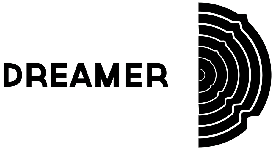 Bold 'DREAMER' text on a green background with a black circular concentric-ring motif on the right edge, resembling a stylized logo.